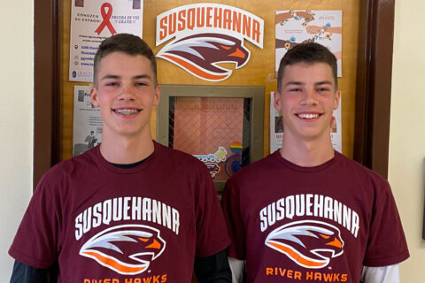 After fleeing war in Ukraine, twin brothers graduate from Md. high school with full scholarships