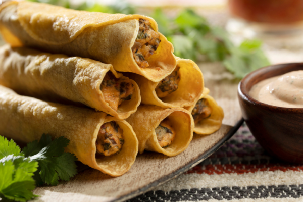 Taquitos on a plate.
