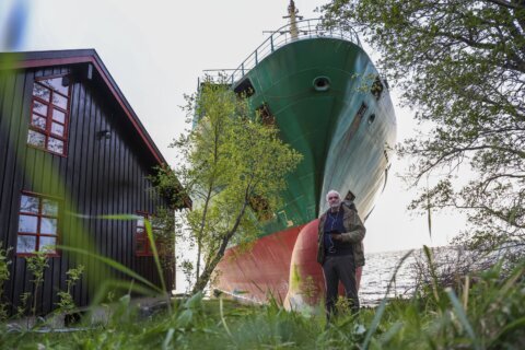 A Norwegian man awoke to find a grounded cargo ship had narrowly missed his home